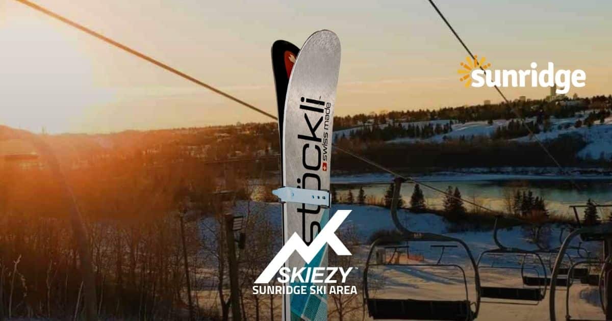 019-Sunridge-Ski-Area-header Sunridge Ski Area scenic feature image with skier, Skiezy Performance Ski Strap, and both Skiezy and Sunridge logos